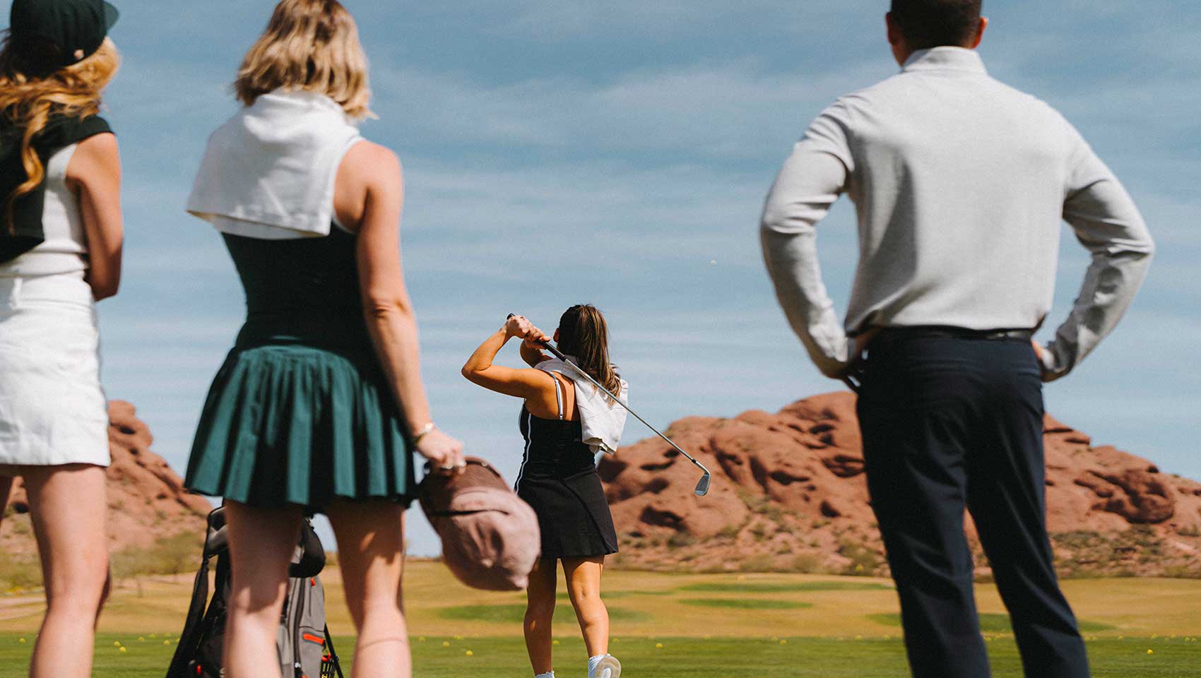 Golf ball on a tee on a golf course
