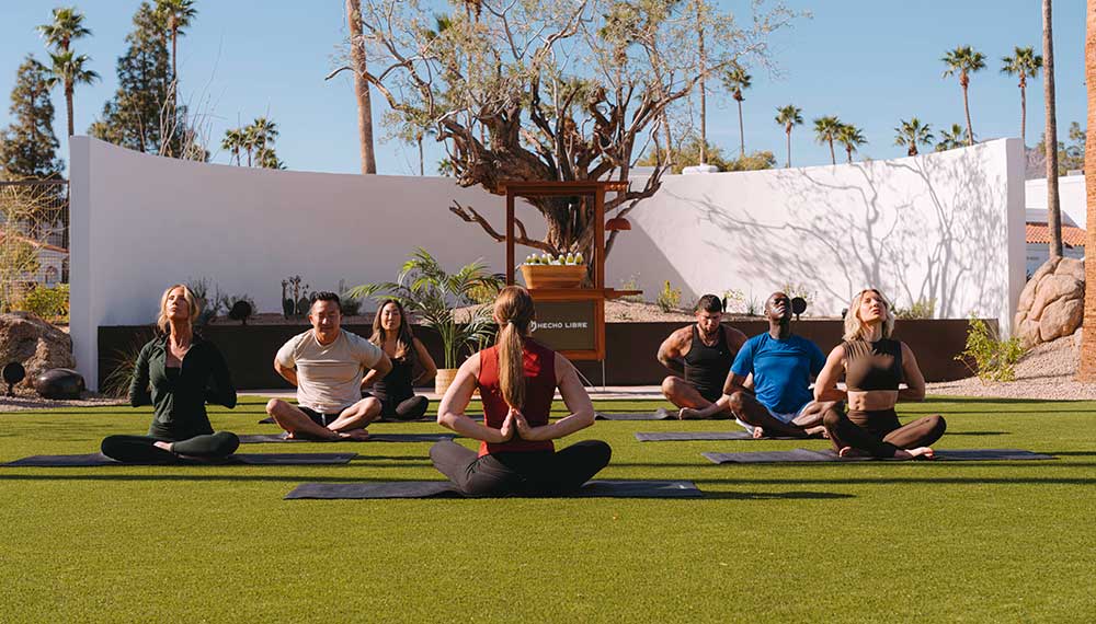 outdoor group yoga at Kimpton Miralina