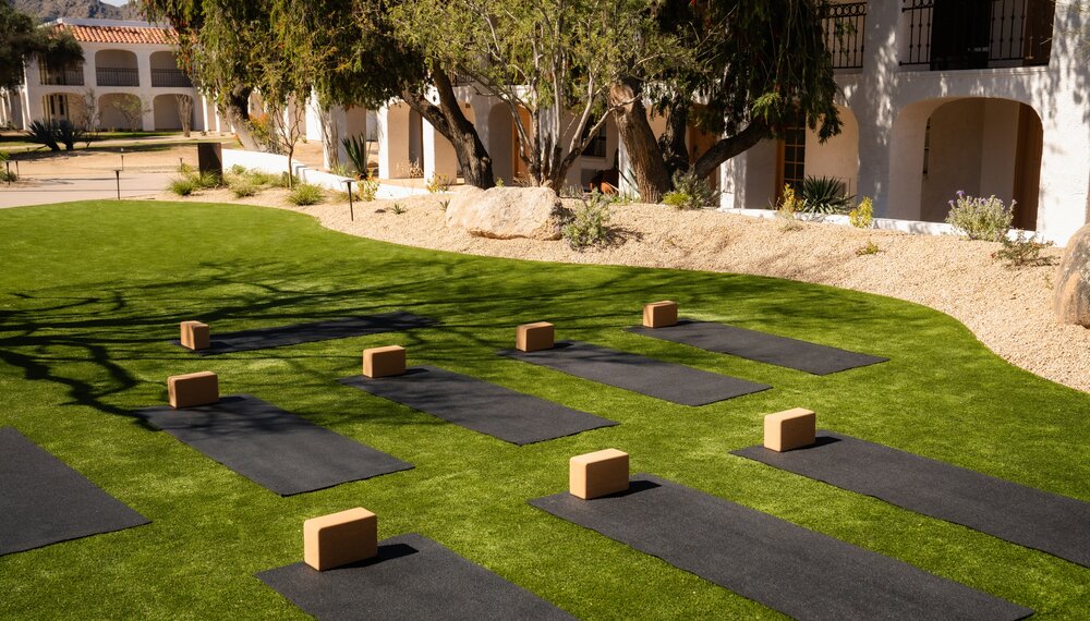 Outdoor yoga mats set up at Kimpton Miralina Resort