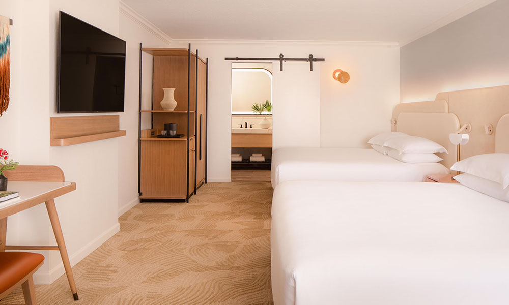 2 King Courtyard View guestroom at Kimpton Miralina