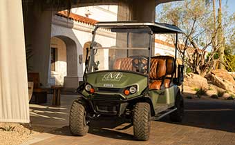 golf cart in front of lobby