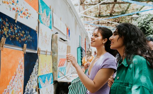 Women looking at art