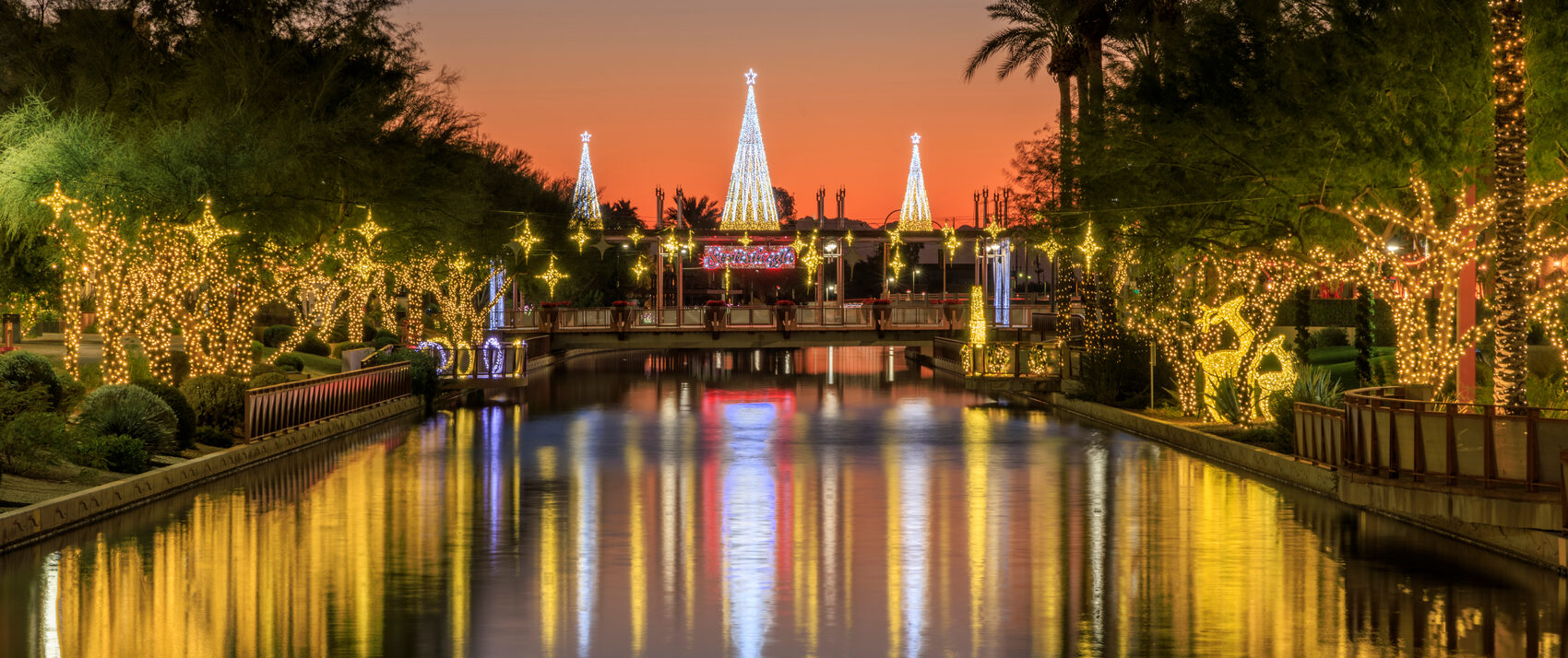 River with holiday lights and decor